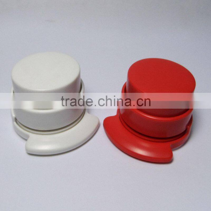 Hand pressed novelty ECO round shaped plastic stapler staplesless