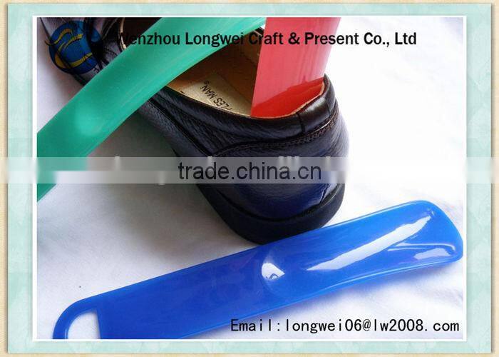 long handled plastic shoehorn/make a shoe horn