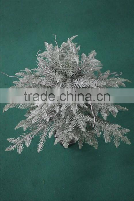 Holy and pure artificial Christmas tree in pot