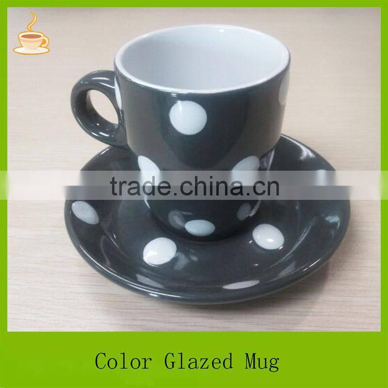 Samll size porcelain coffee mug with saucer set, black and green color glazed with white dots