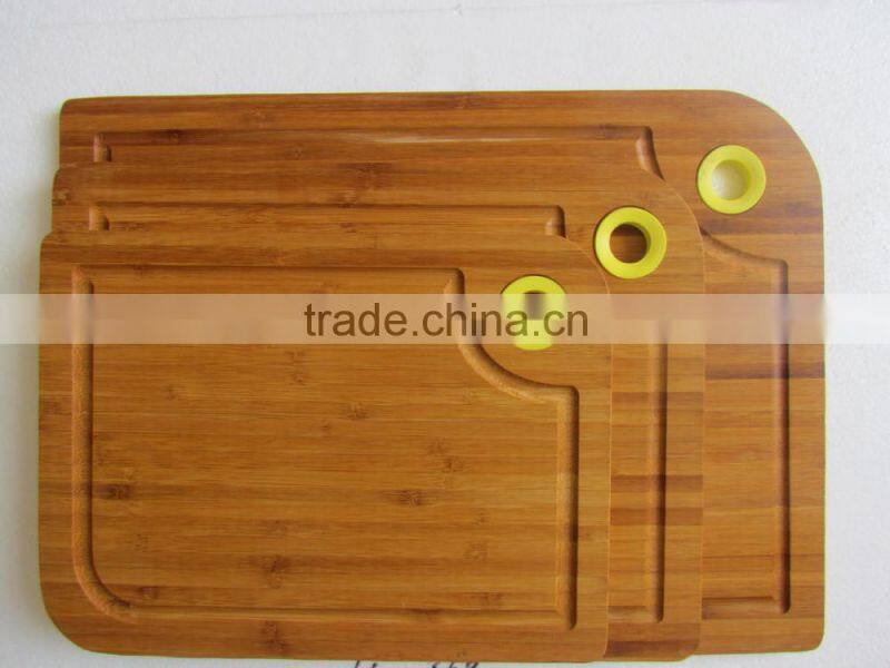 Three size bamboo cutting board with silicon handle