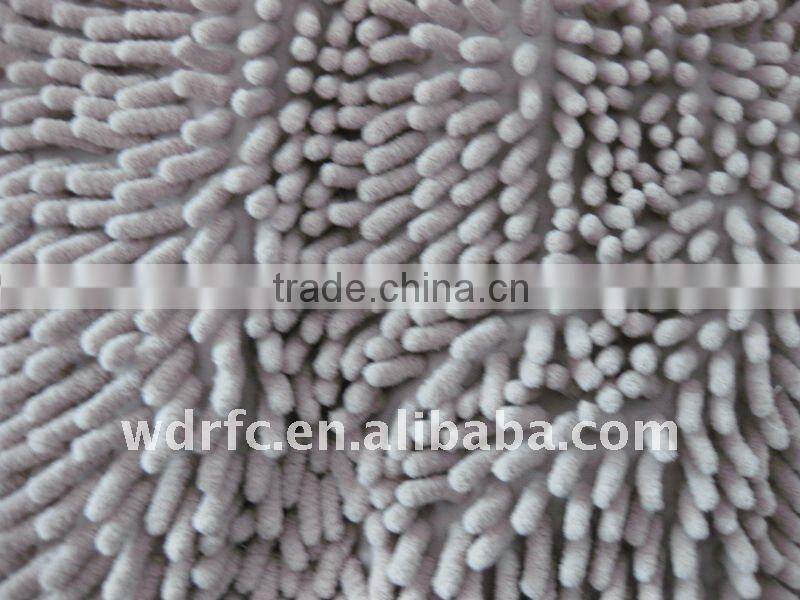 Pile rug fabric