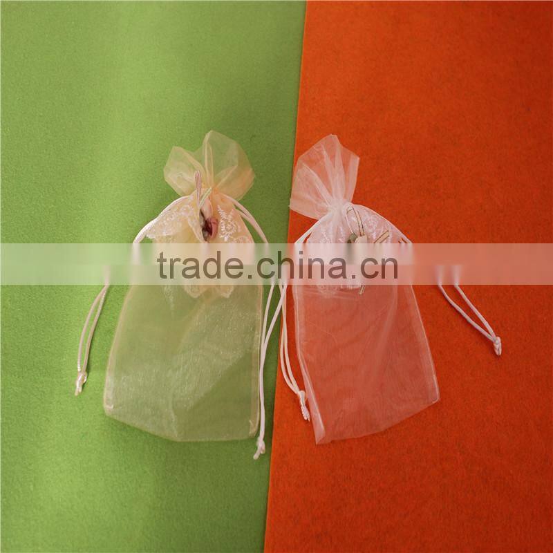 China cheap drawstring organza gift bags with logo ribbon