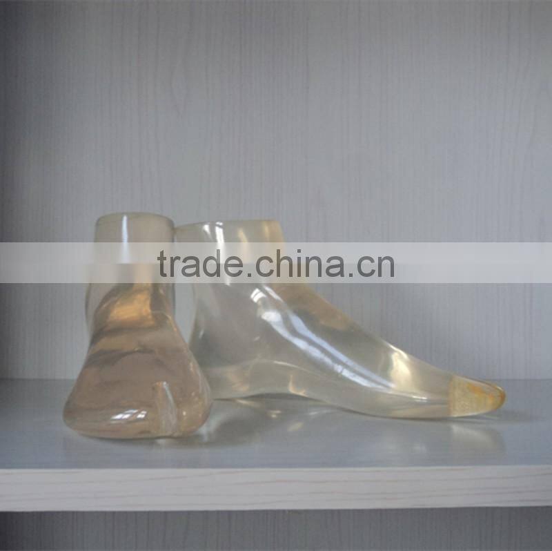 Fashion shoes display Golden mannequin feet and foot