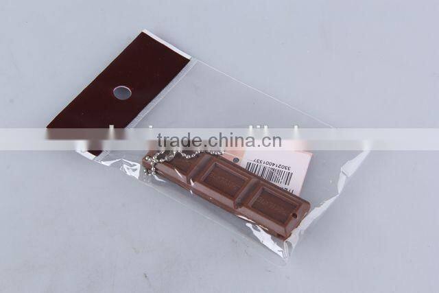 Chocolate shaped hair brush with hanging chain/folding comb