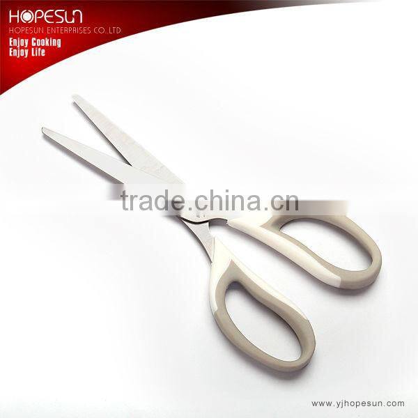 Red color plastic handle scissors
