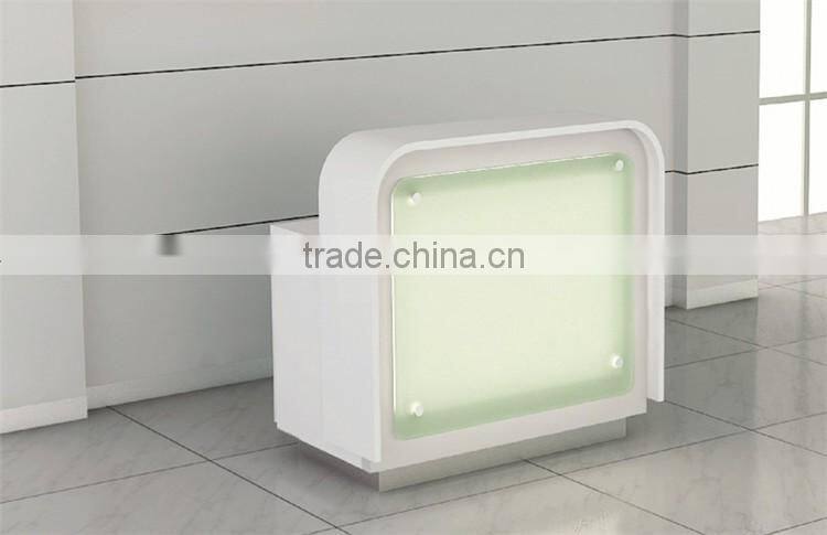Cloth shop glass reception desk with LED light inside