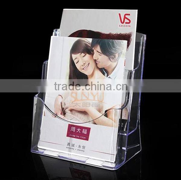 White acrylic brochure stand