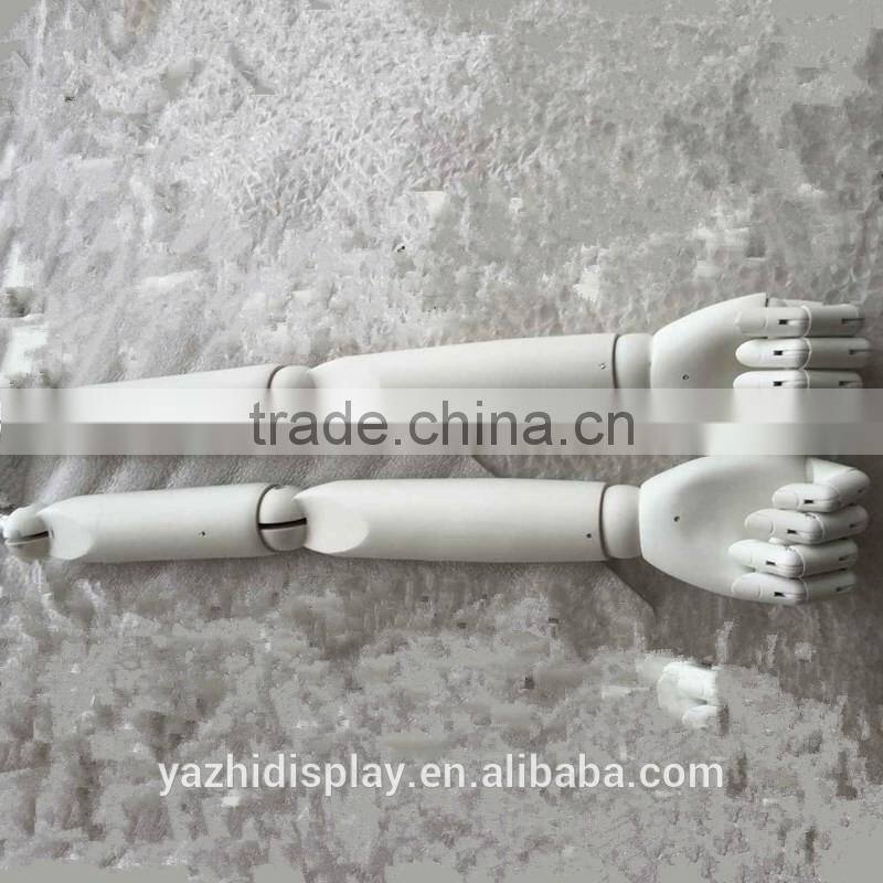 White wooden mannequin arm use for dress form