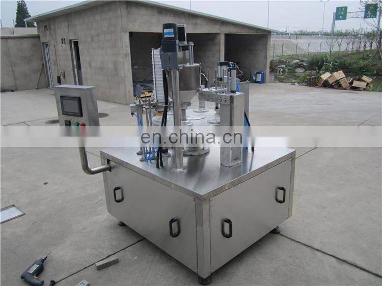 Automatic liquid cup water cup rotary filling and sealing machine