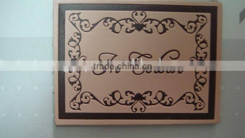 engraved decorate garment brown leather patch