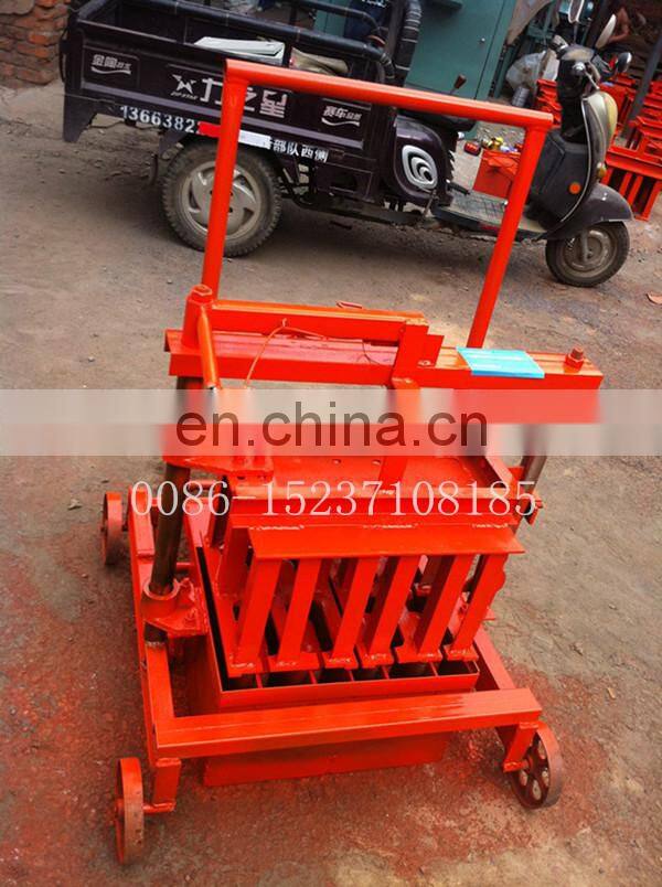 Home use manual cement brick making machine