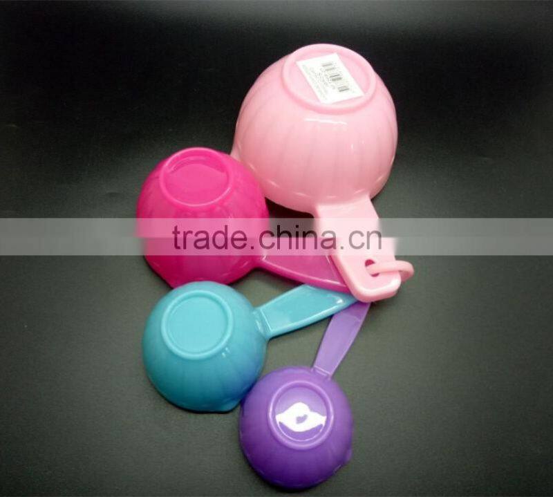 colorful set of 4 plastic measuring cups and spoons