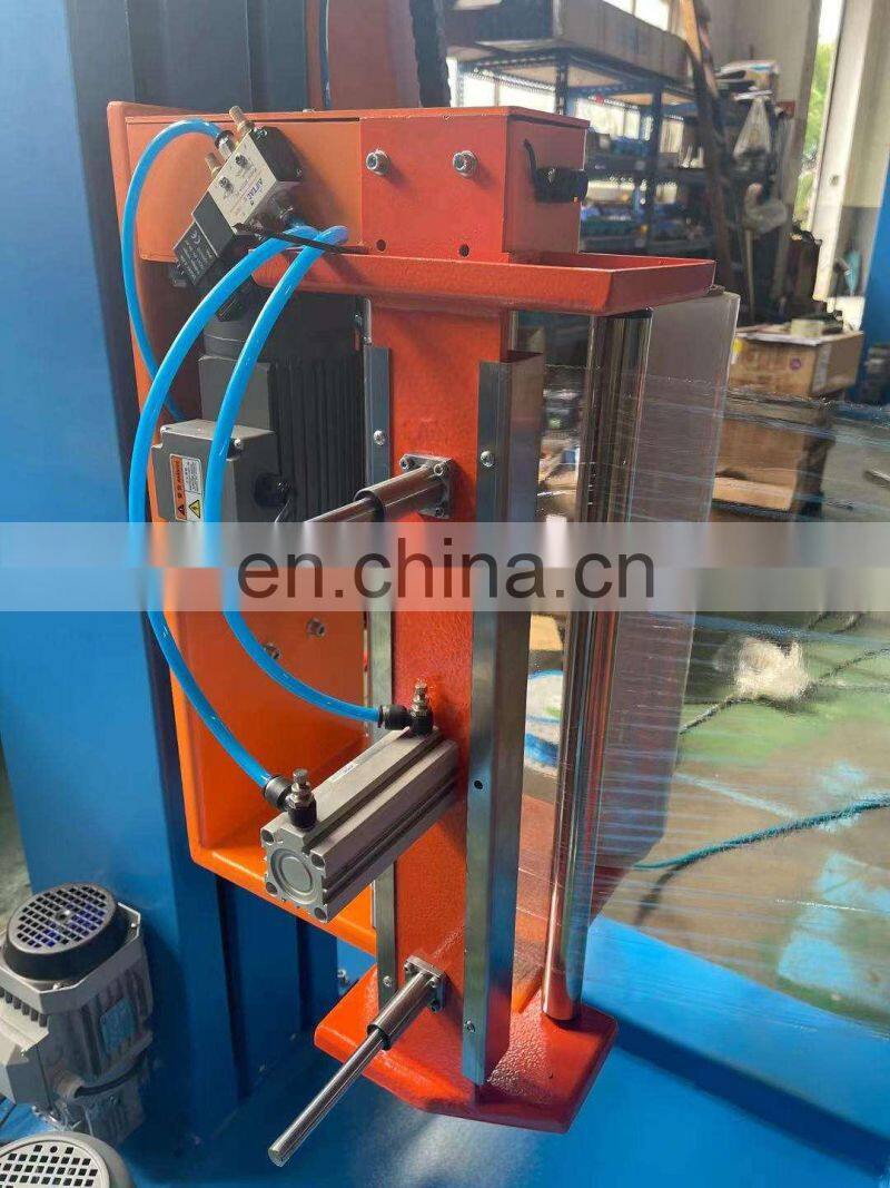 Manufacturer of Brick and cement pallet stretch wrap machine and stretch wrapper