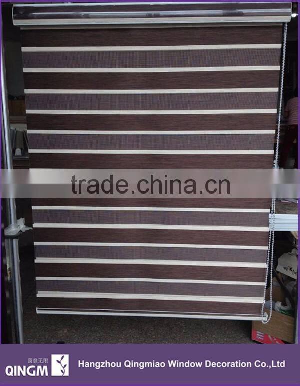 Horizontal pattern and rolling up window blinds in zebra design