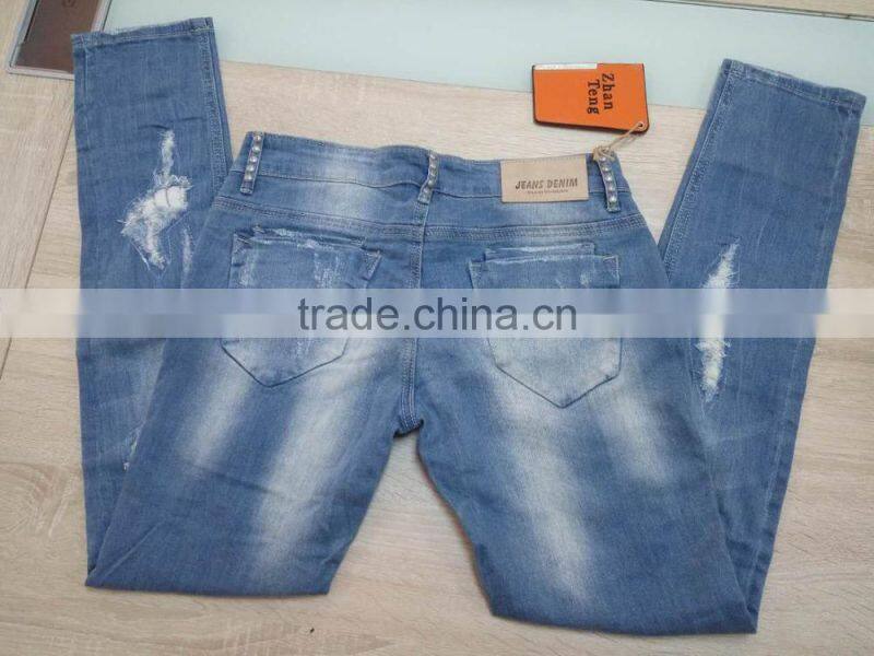 GZY cheap woman fashion Stocklots Women scratch jeans factory