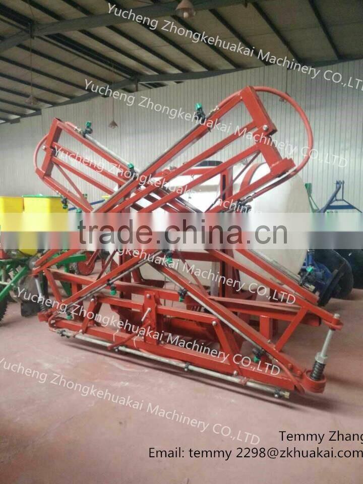 Tractor boom sprayer