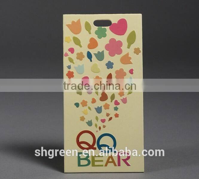 Center fold paper hangtag with plastic string tags for jeans denim