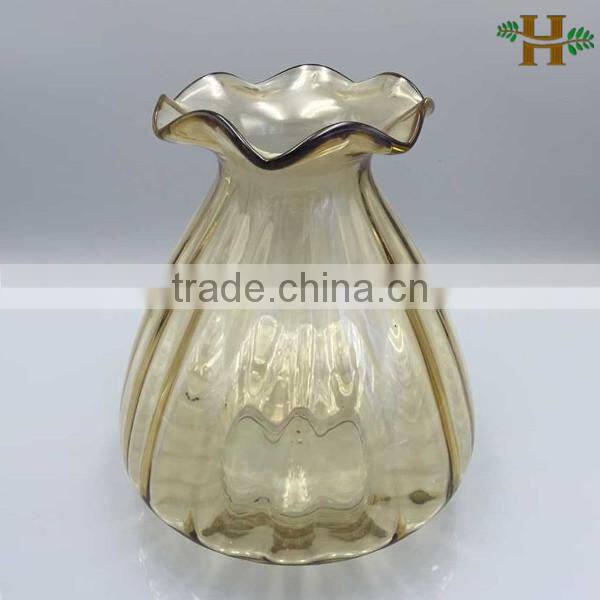 waved cone glass vase with flower shaped opening