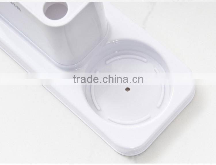 Coupled Toothbrush holder