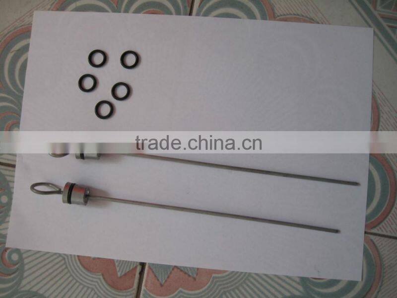 Farm tractor diesel engine oil indicating stick