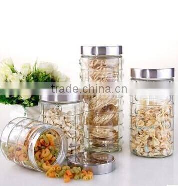clear cylinder glass storage jar with air bubbles and stainless steel lid
