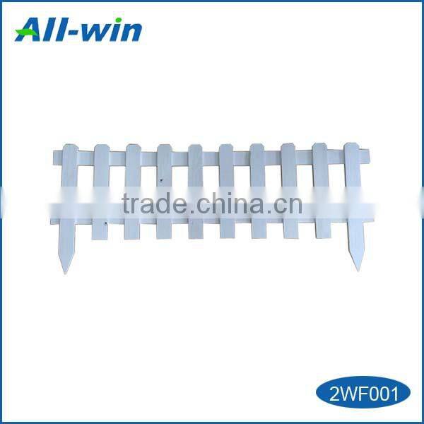 wooden garden fence, timber picket fence with extended spiked end sections