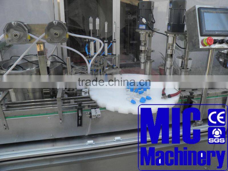 Micmachinery easy control liquid filling machine 30ml Oral liquid filling machine Vial filling plugging capping machine