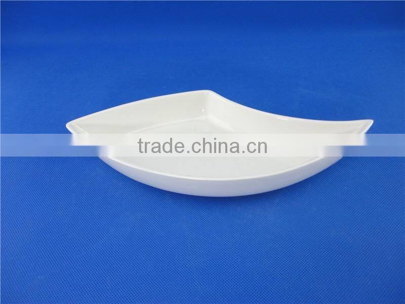 white porcelain peacock fruit dish