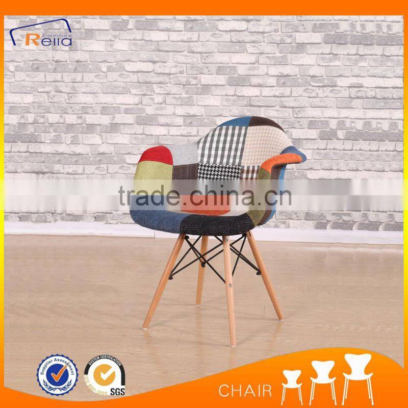 Colorful fabric chair with wood legs