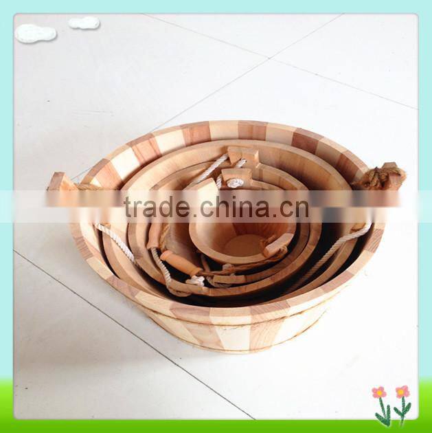 handmade wooden barrel or wooden bucket with water