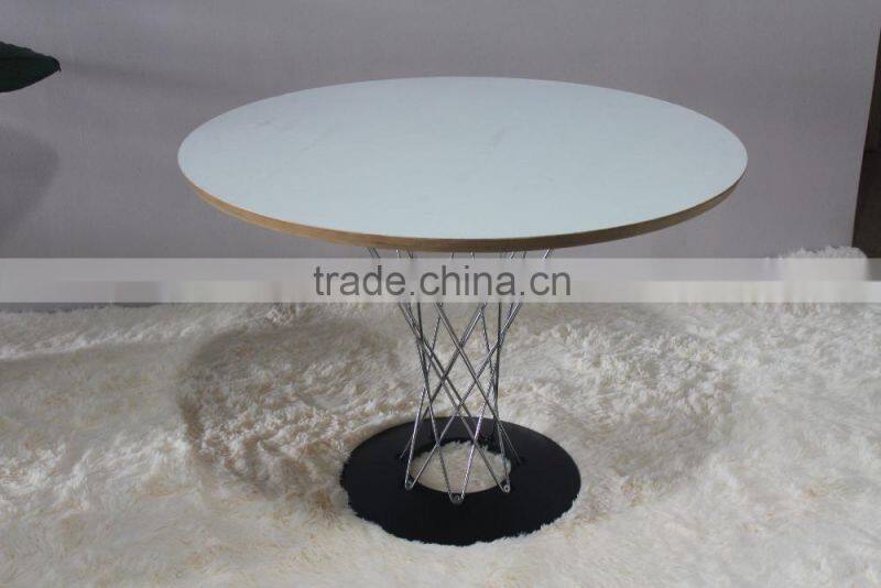 chrome finish frame matt color cyclone table by Isamu for dining room