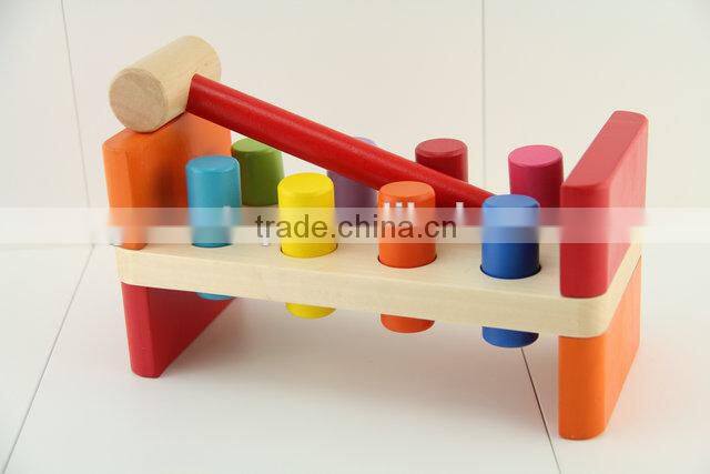 Wooden workbench toy with wooden hammer