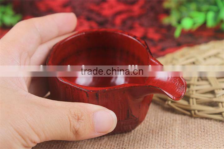 With a mouth wooden wine glass