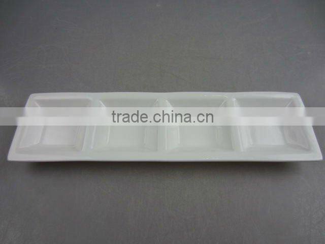 Stock white porcelain four division sauce dish