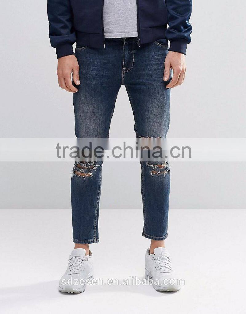 Men Custom Apparel Skinny Cropped Jeans Ripped Denim Pants With Extreme Rips In Blue Wash
