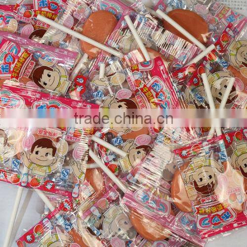 Flat lollipop wrapping machine