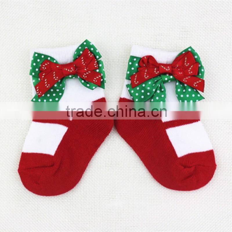 Customized happy cute Christmas baby socks with bowknot for holiday made of cotton
