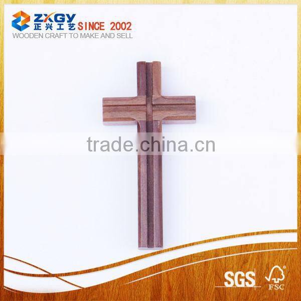 small wooden cross pendant