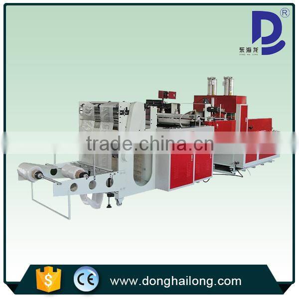 Hot seal and cool cut bottom sealing bag making machine