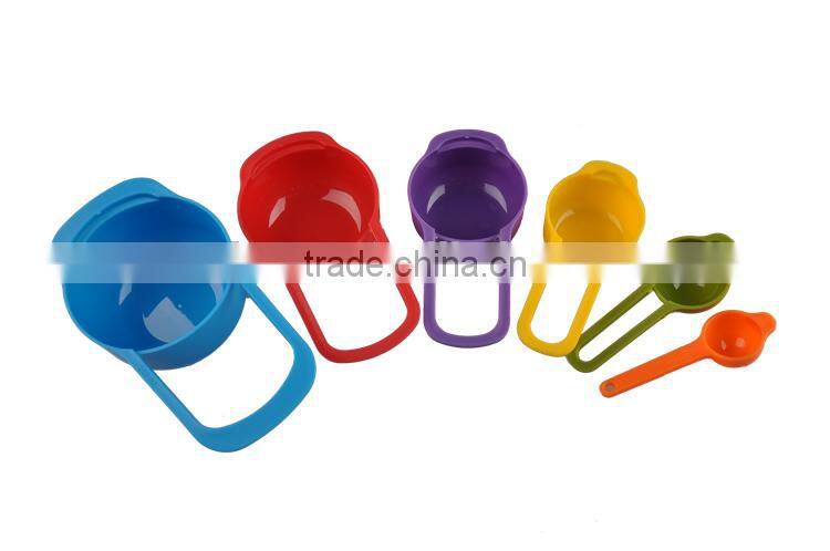 Small plastic measuring cups