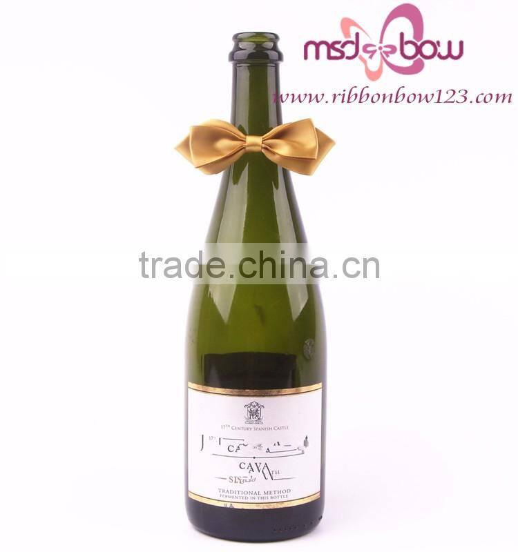 gold satin ribbon bow for gift packaging