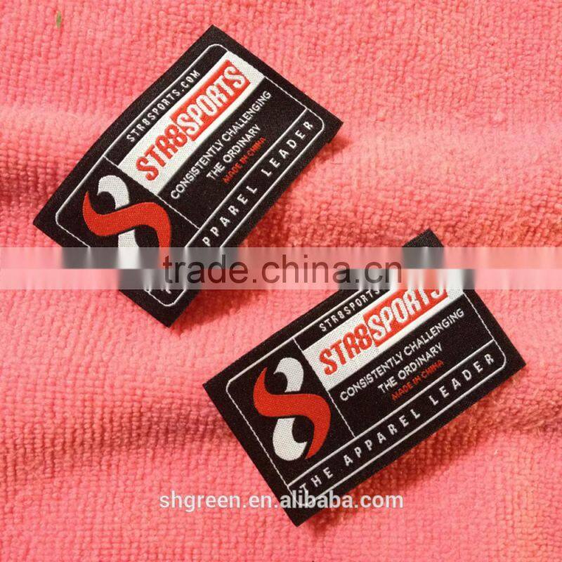 Wood spindle satin weaving label