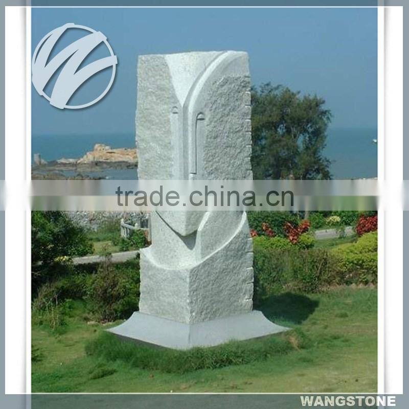 Abstract Outdoor Stone Human Faces Sculpture