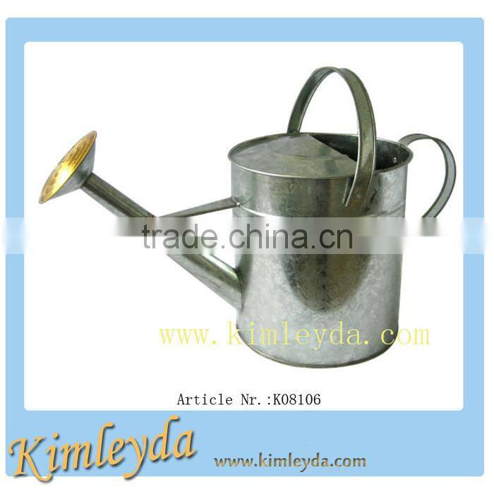 metal watering can
