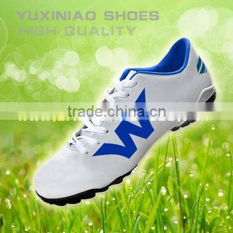 classic new style football shoes have spike to play soccer ball for american or english