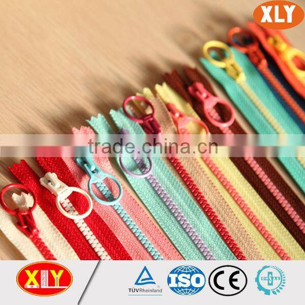 xly fancy white tape gold teeth zipper , plastic zipper