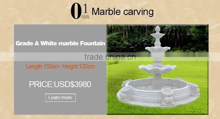hand carved nature stone fountain with little boy