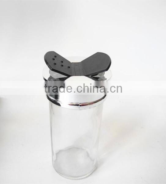 small clear glass paragon spice jars with butterfly cap