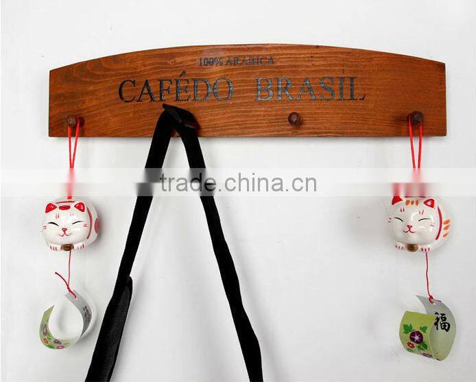 brown zakka wooden wall hanging